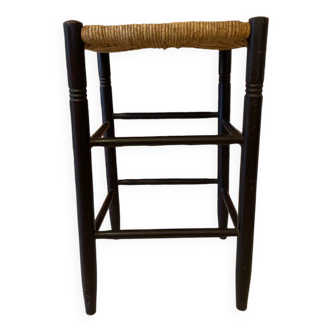 High stool made of wood and straw
