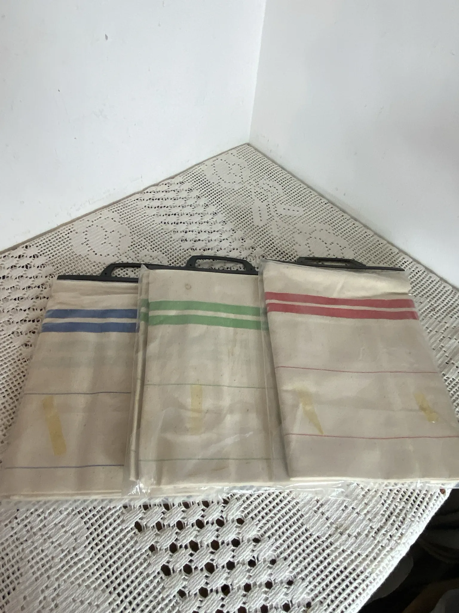Three new multicoloured tea towels made of Cholet fabric, 100% cotton.