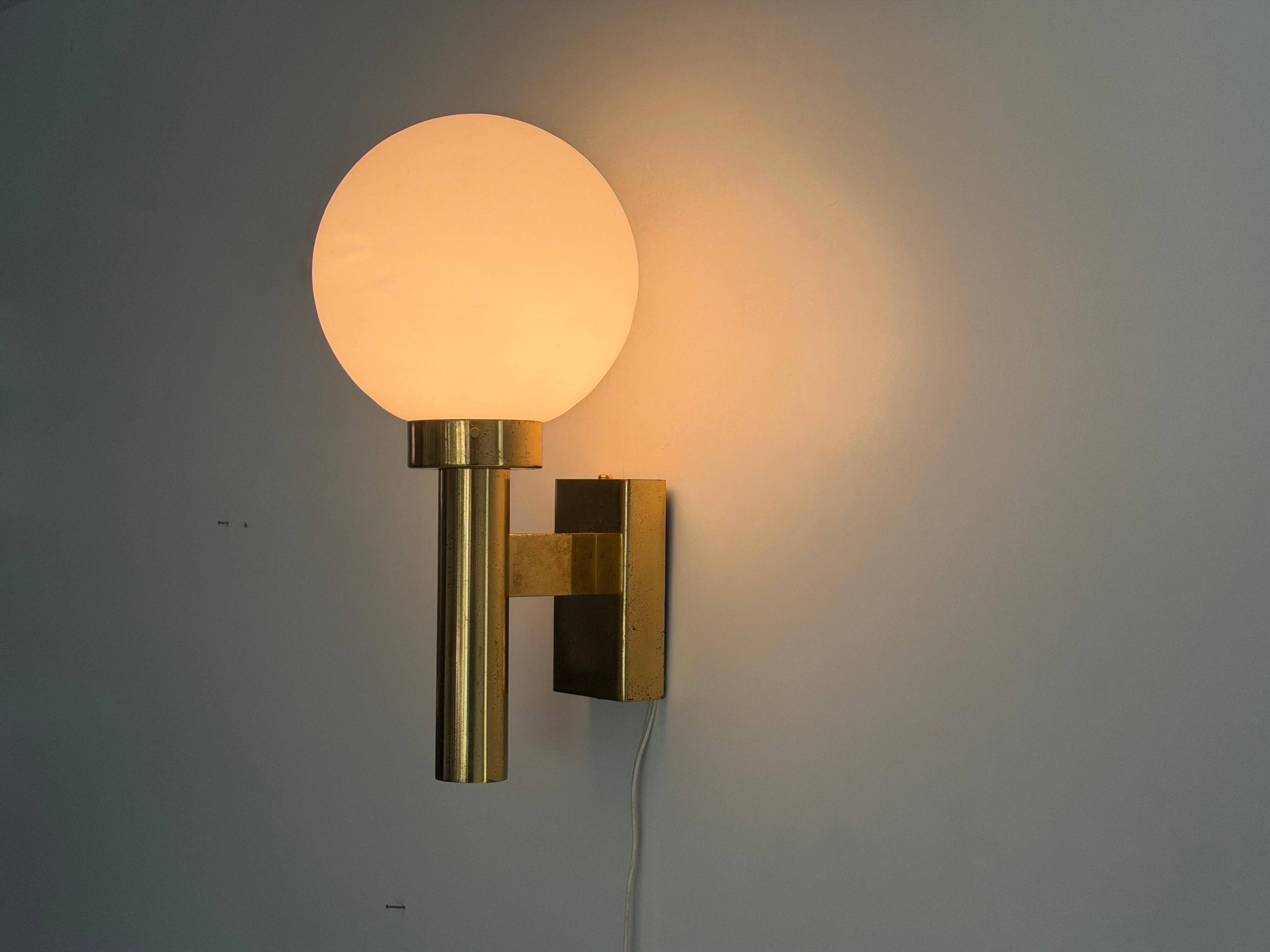 Large minimalist cinema wall light in opal glass and heavy brass, 1960s, Germany