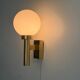 Large minimalist cinema wall light in opal glass and heavy brass, 1960s, Germany