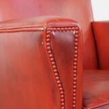 Fauteuil peint en rouge en cuir de mouton