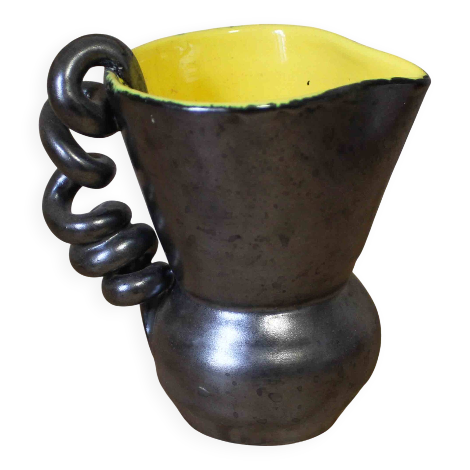 Ceramic jug with a twisted handle