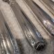 12 silver-plated Empire style table knives 25.3cm