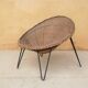Fauteuil vintage en rotin pieds métal