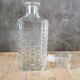 Carafe en verre ciselé