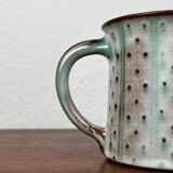 Mid-century modern studio pottery mug by Monika Maetzel, 1960s.