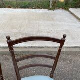 2 Napoleon III chairs in solid wood and blue satin fabric.