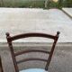 2 Napoleon III chairs in solid wood and blue satin fabric.