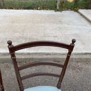 2 Napoleon III chairs in solid wood and blue satin fabric.