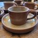 Service of 5 cups and saucers in brown stoneware – 1970s–1980s
