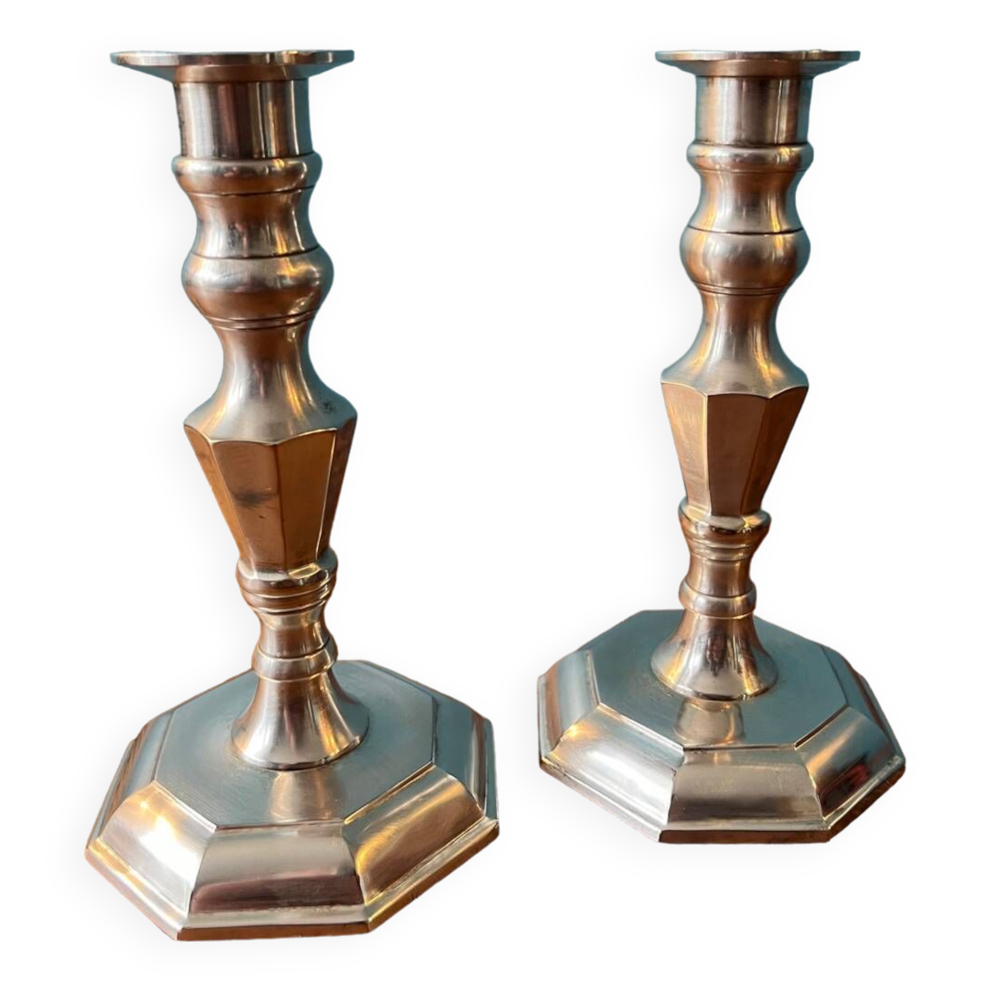 Pair of silver metal candlesticks