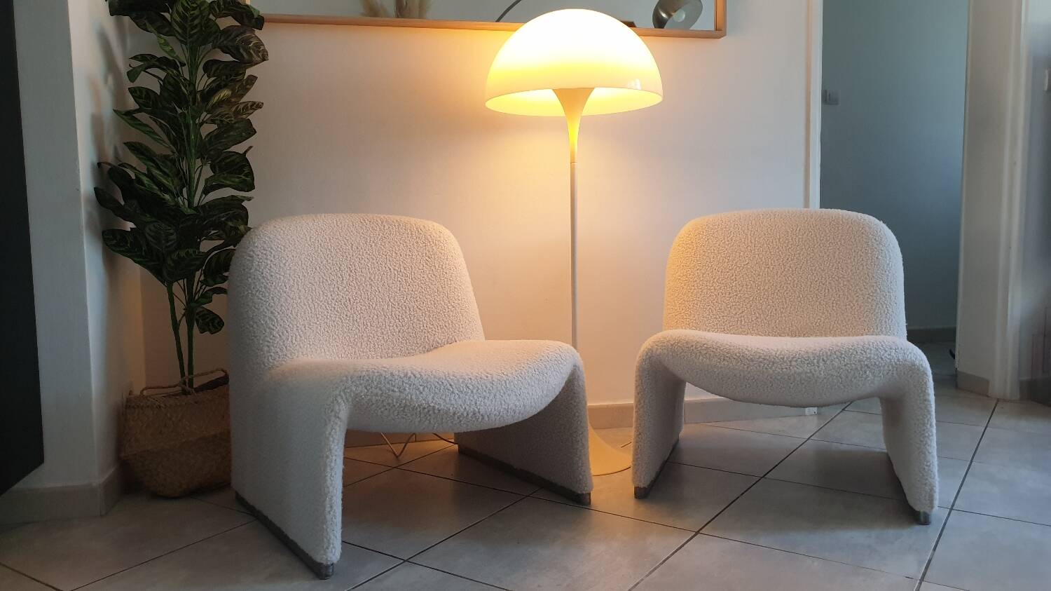 Pair of alky armchairs by Giancarlo Piretti