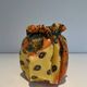 Trompe-l'Œil Ceramic Vase in the Shape of a Knotted Bag with Floral Decoration. Work