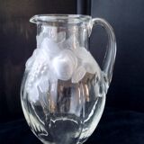 Large water jug with embossed fruit decoration in frosted glass