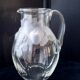 Large water jug with embossed fruit decoration in frosted glass