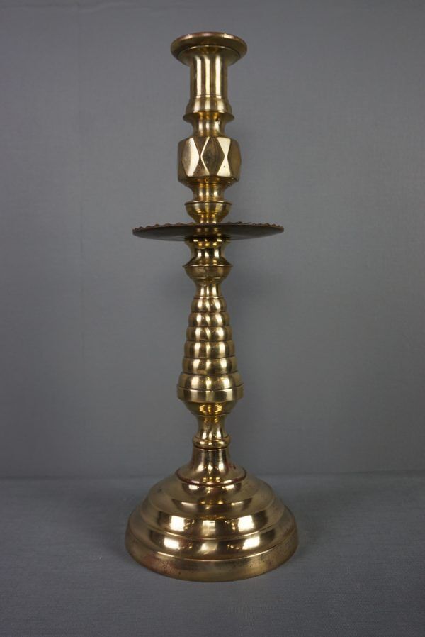 Old yellow copper neck candle holder