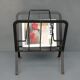 Black painted metal magazine holder