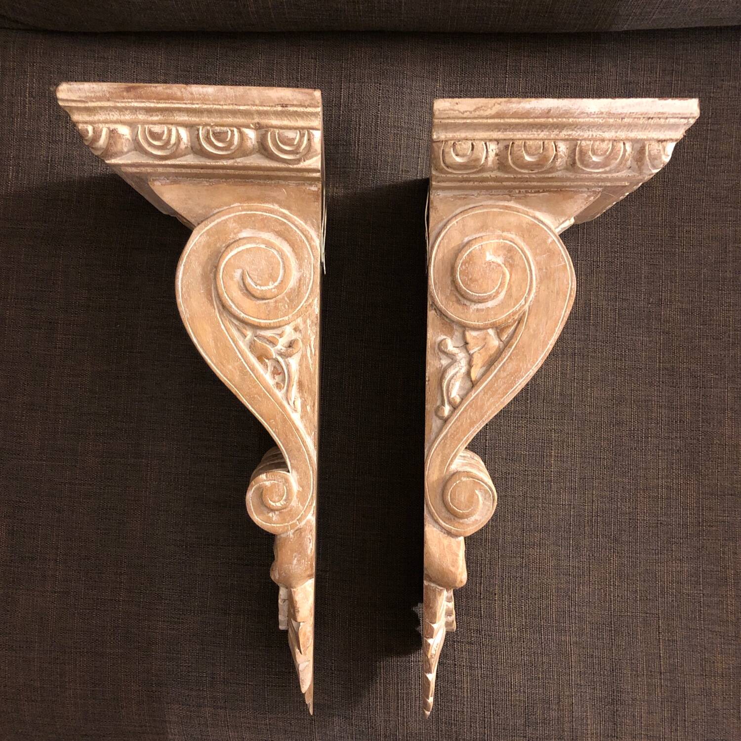 Pair of carved solid wood consoles
