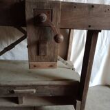 antique workbench with one drawer and two vices