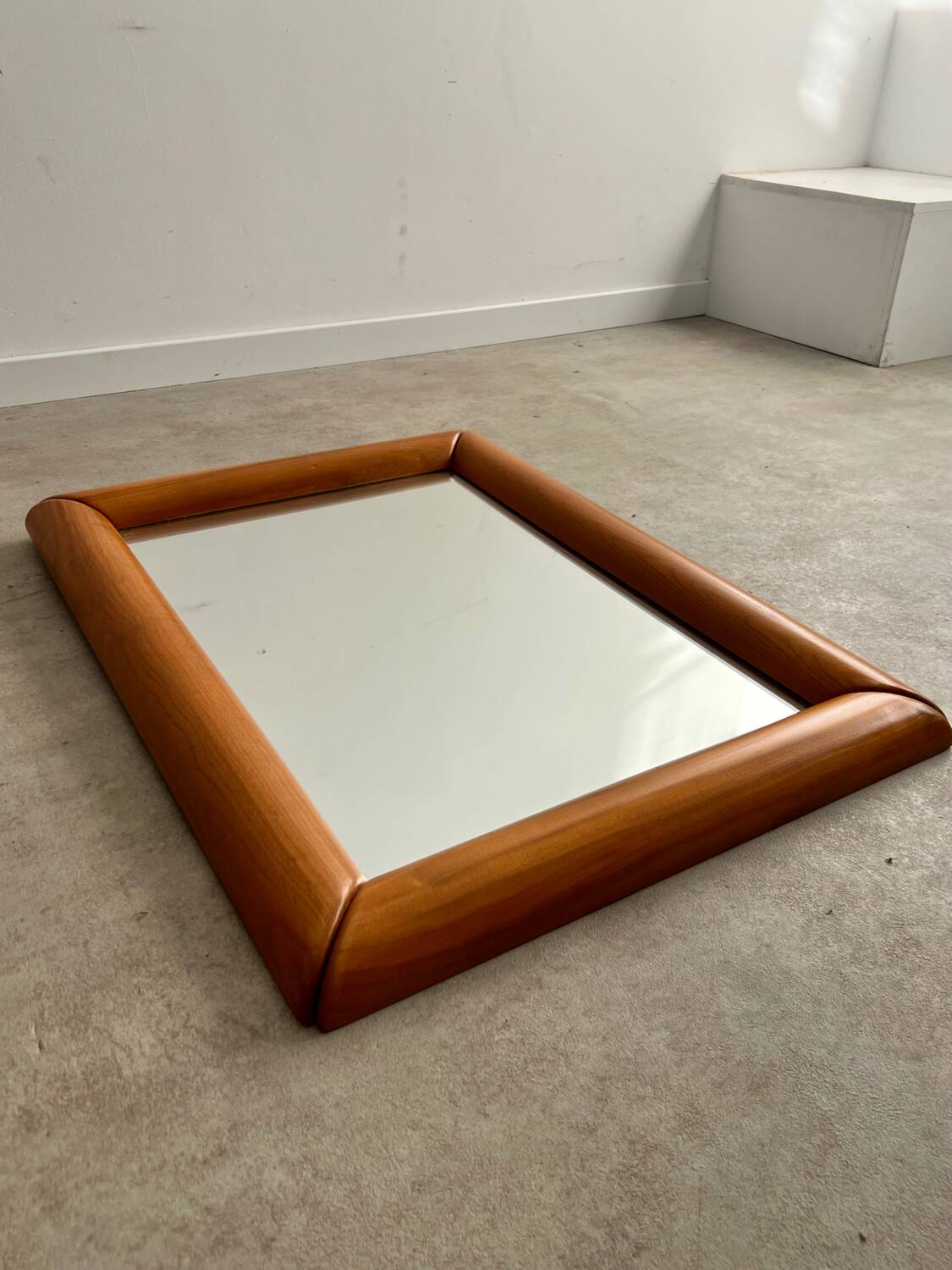 Old mirror in solid elm design from the 70s vintage brutalist style