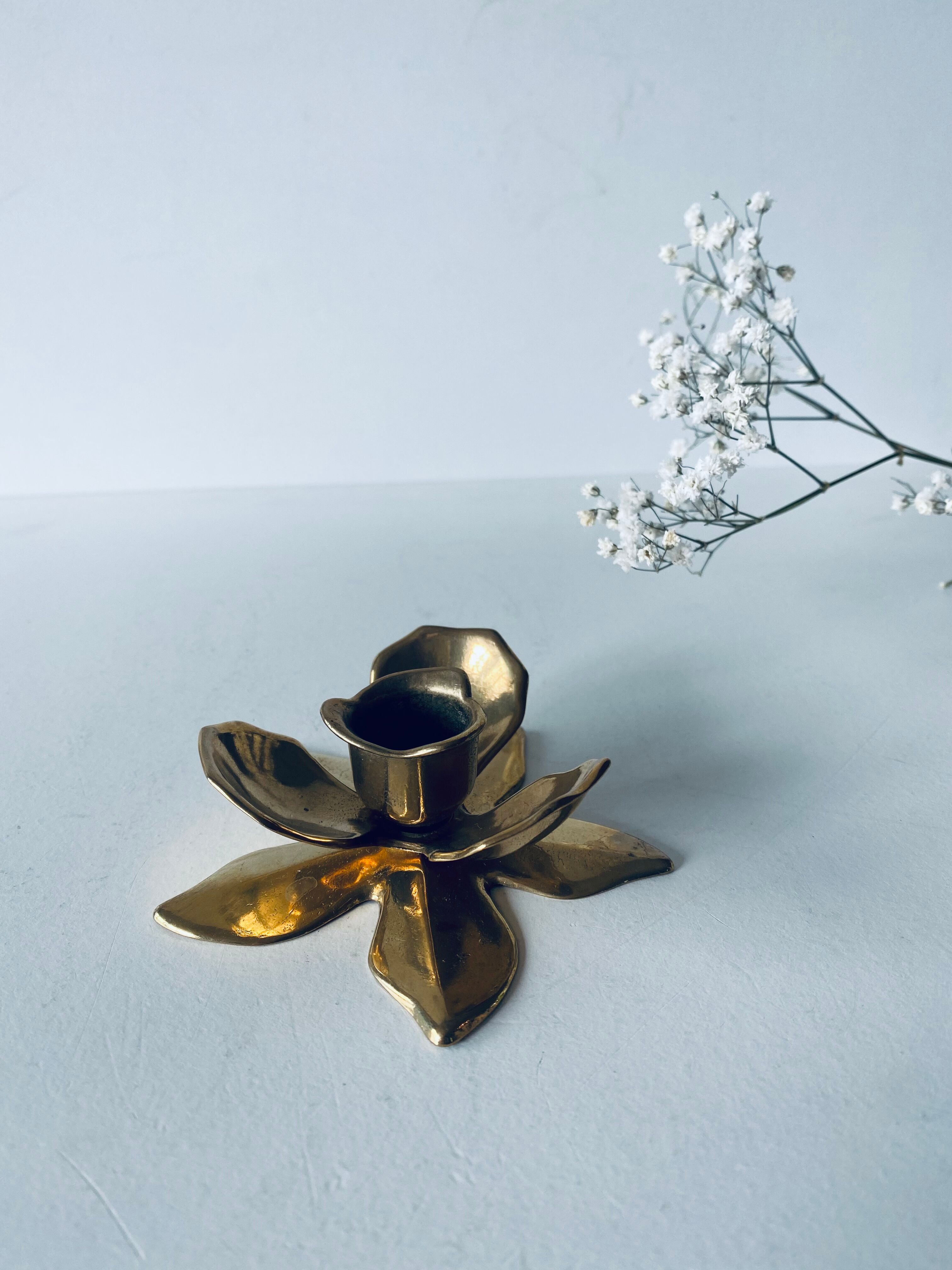 Brass flower candlestick