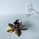 Bougeoir fleur en laiton