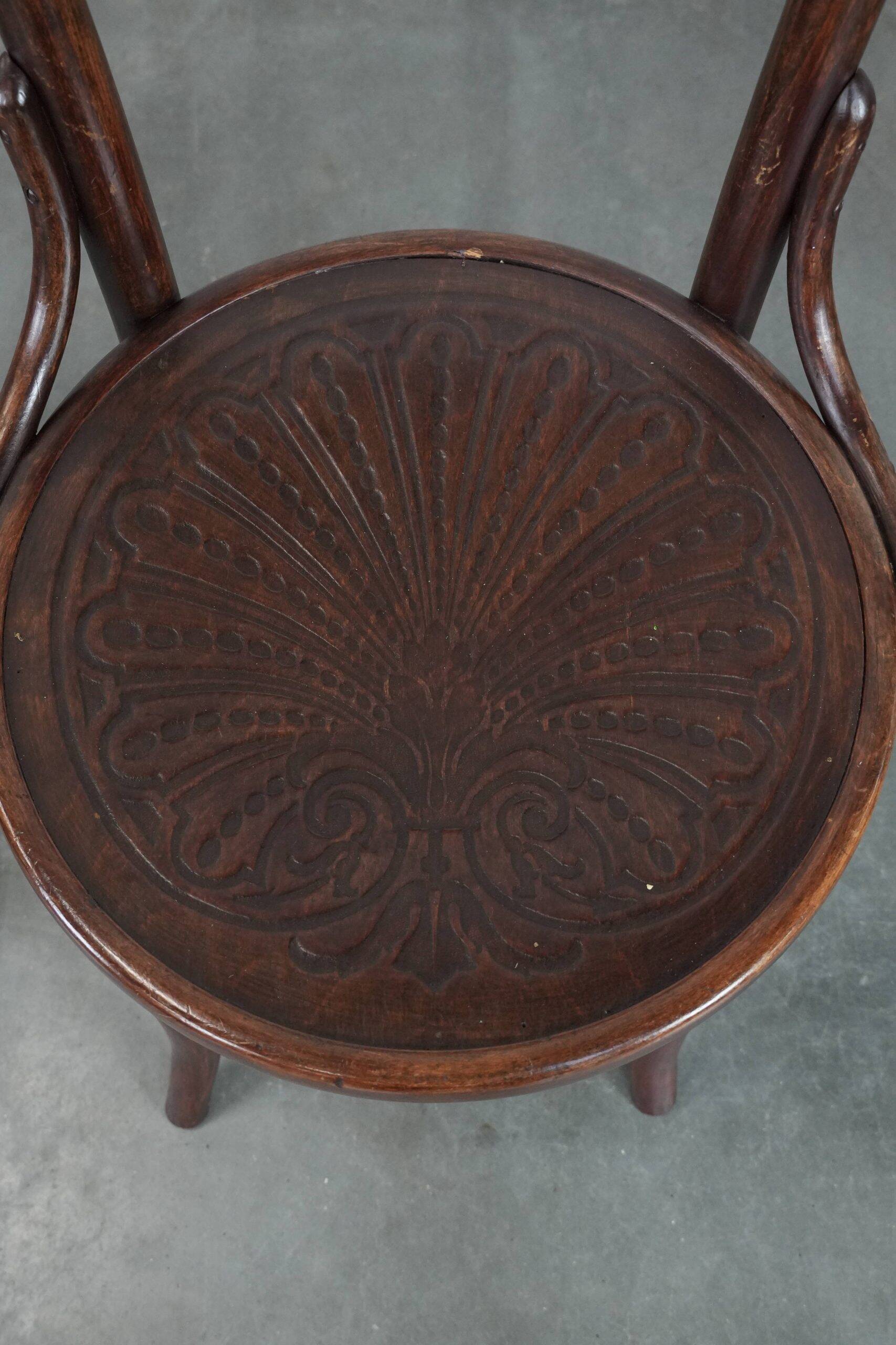 Set of five vintage wooden Cosmos bistro design chairs with stunning detail