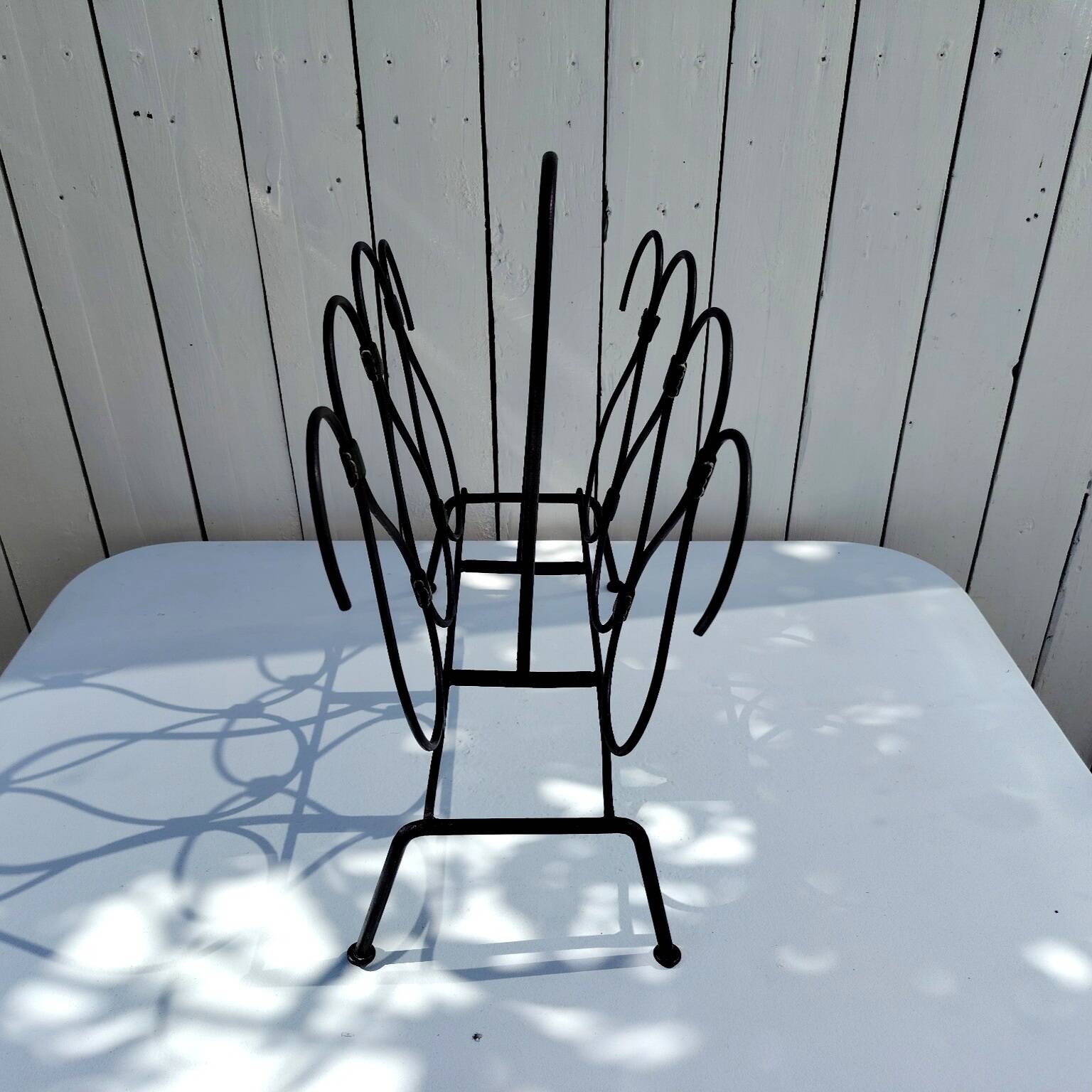 Metal and leather magazine rack, attributed to Jacques Adnet, vintage