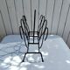 Metal and leather magazine rack, attributed to Jacques Adnet, vintage