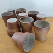 Stoneware cups – Armor stoneware set of 10 and an 11th French stoneware cup.