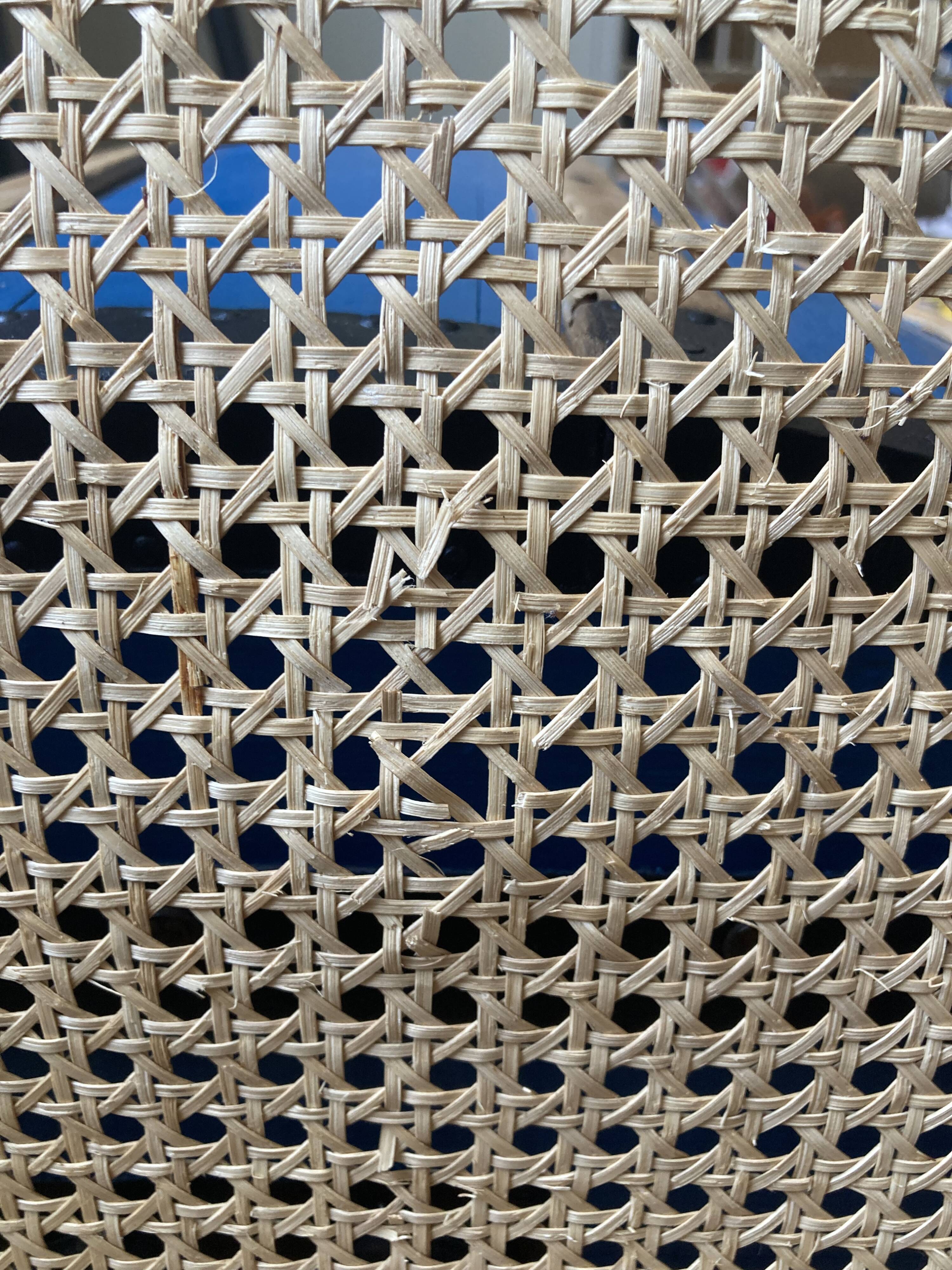 Plia chairs by Castelli in wood and cane.