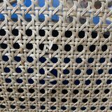 Plia chairs by Castelli in wood and cane.