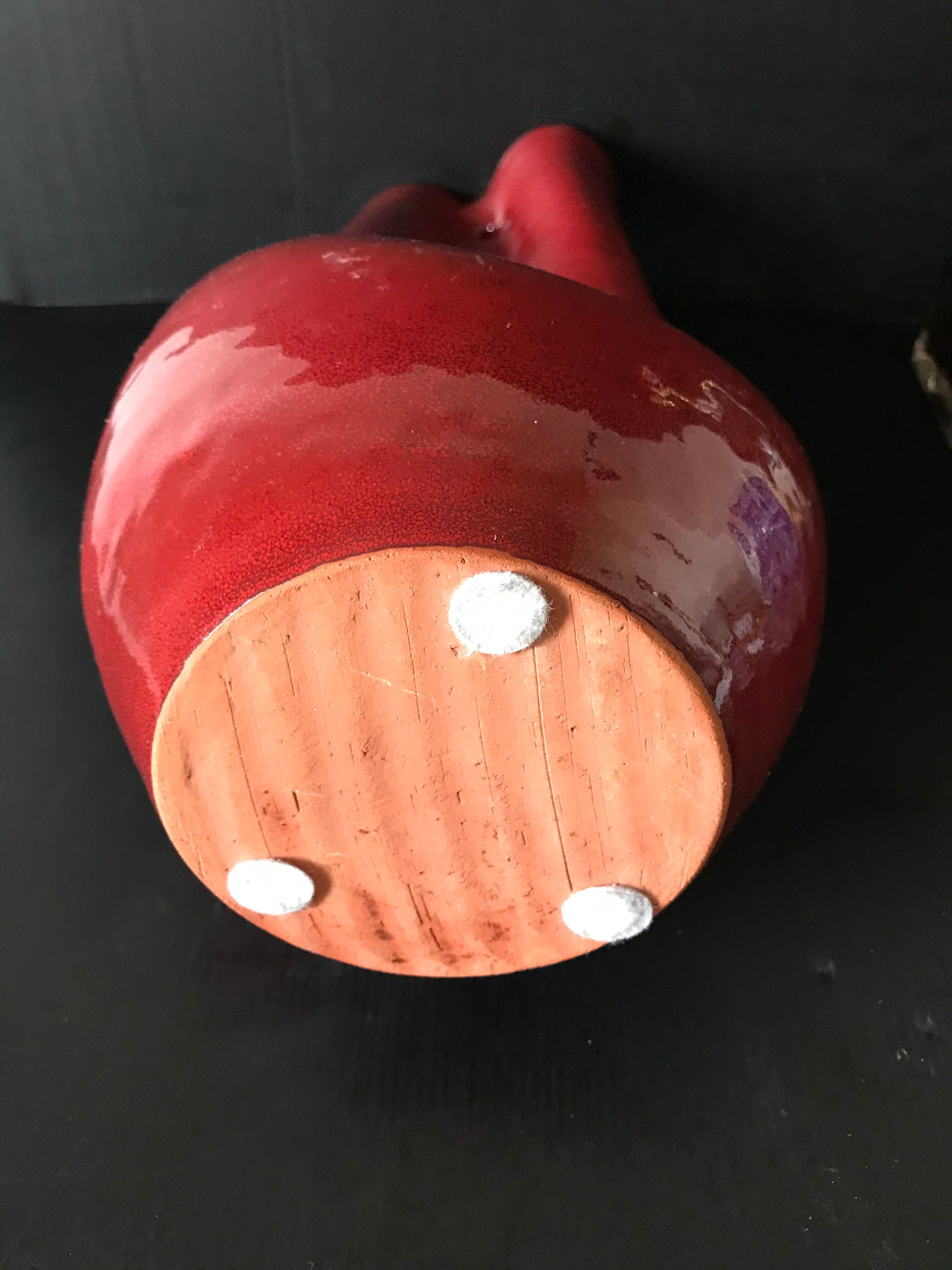 Red ceramic vase