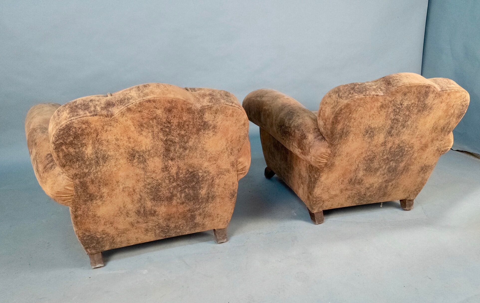 Pair of club deco armchairs