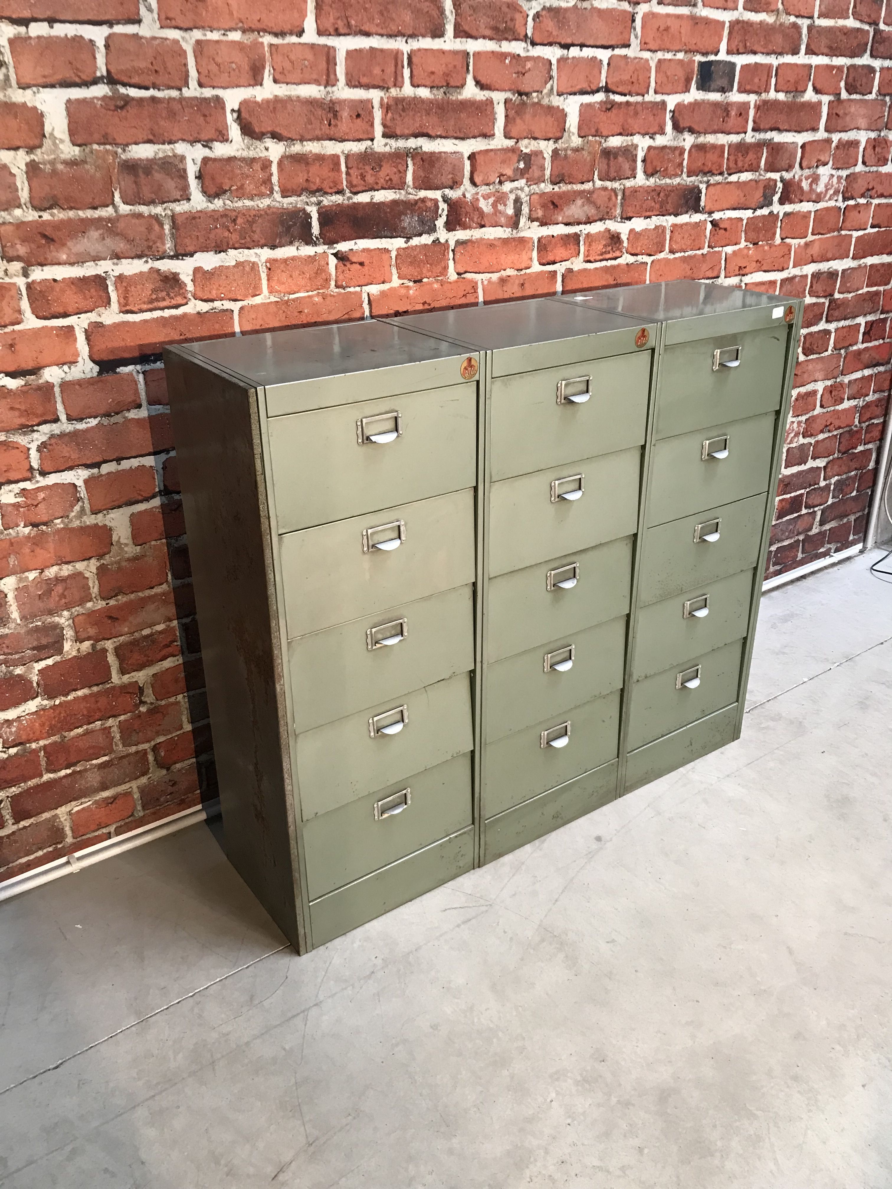 Vintage industrial furniture with metal clamshell atal