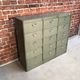 Vintage industrial furniture with metal clamshell atal