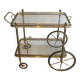 Neoclassical brass rolling table from Maison Baguès