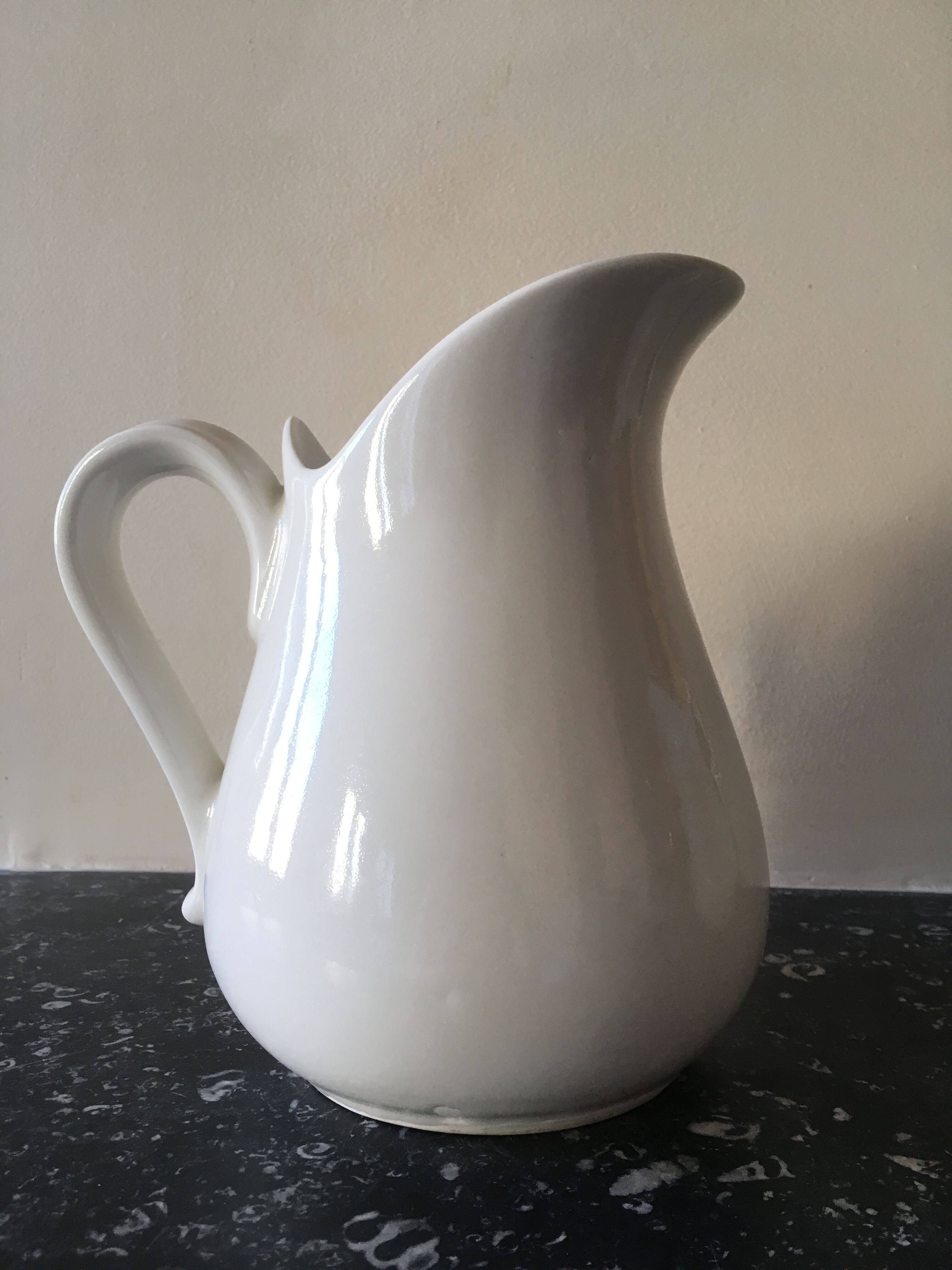 Broc in white fire porcelain with large spout