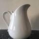 Broc in white fire porcelain with large spout