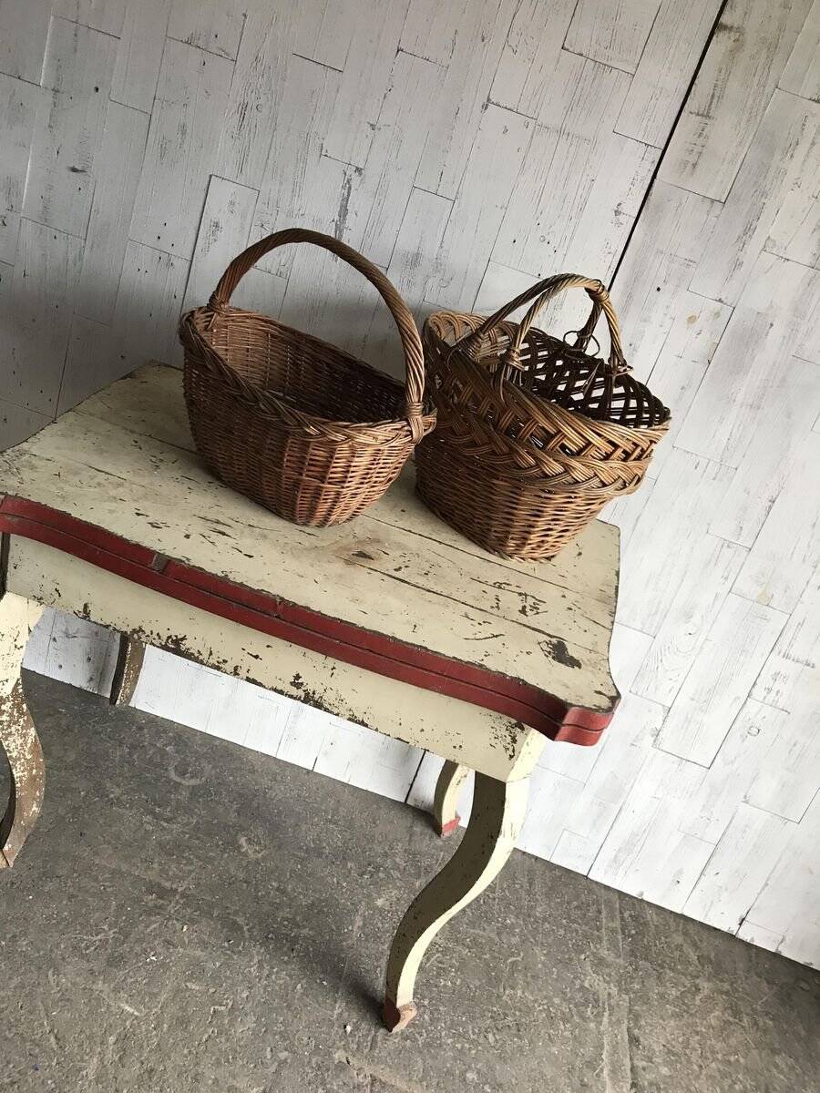 Set of 2 brown wicker baskets from the 1960s — decorative weaving and double handles.