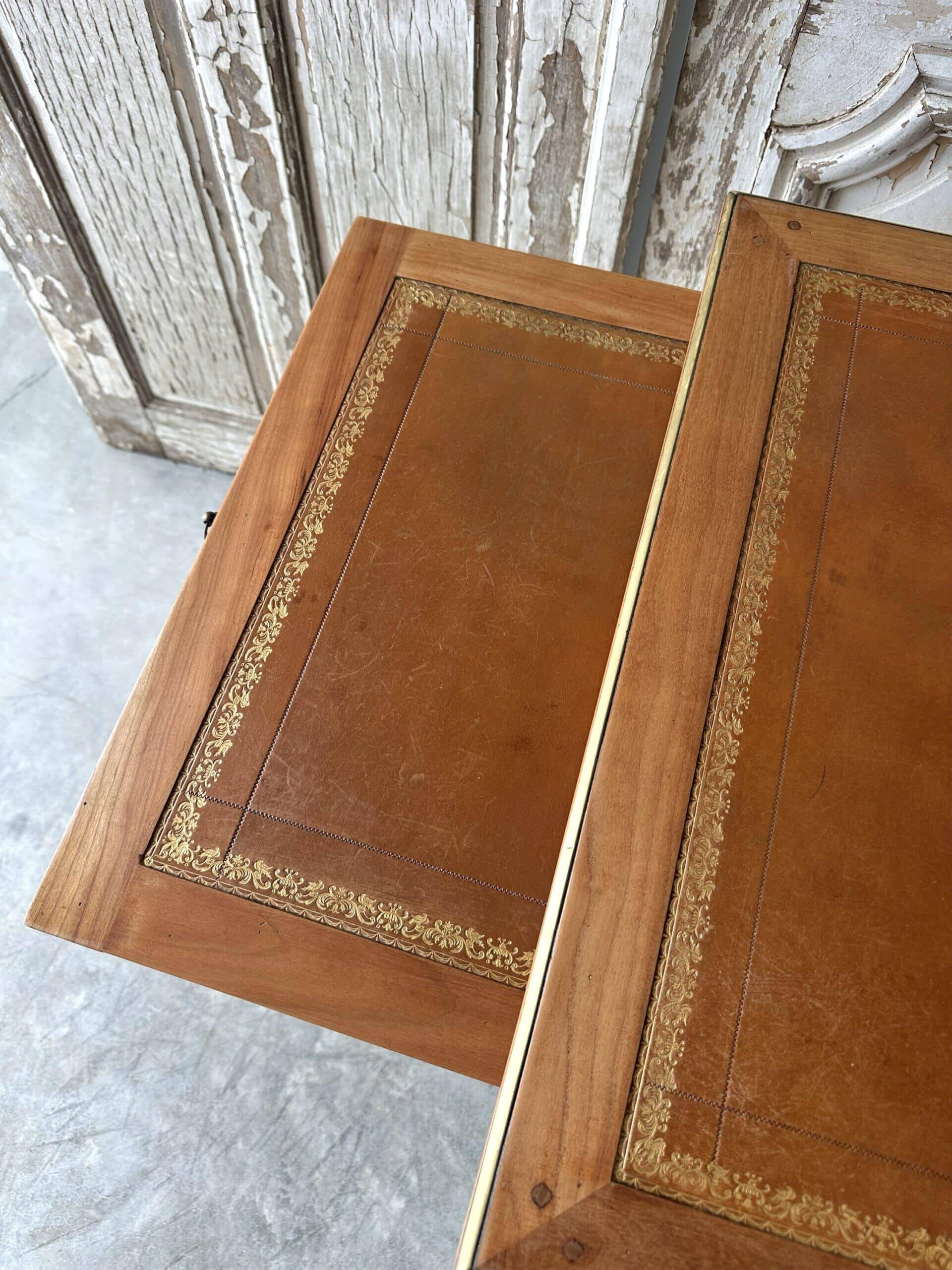 Directoire style flat desk circa 1960 in light cherry wood.
