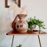 Old sandstone vase painted flowers