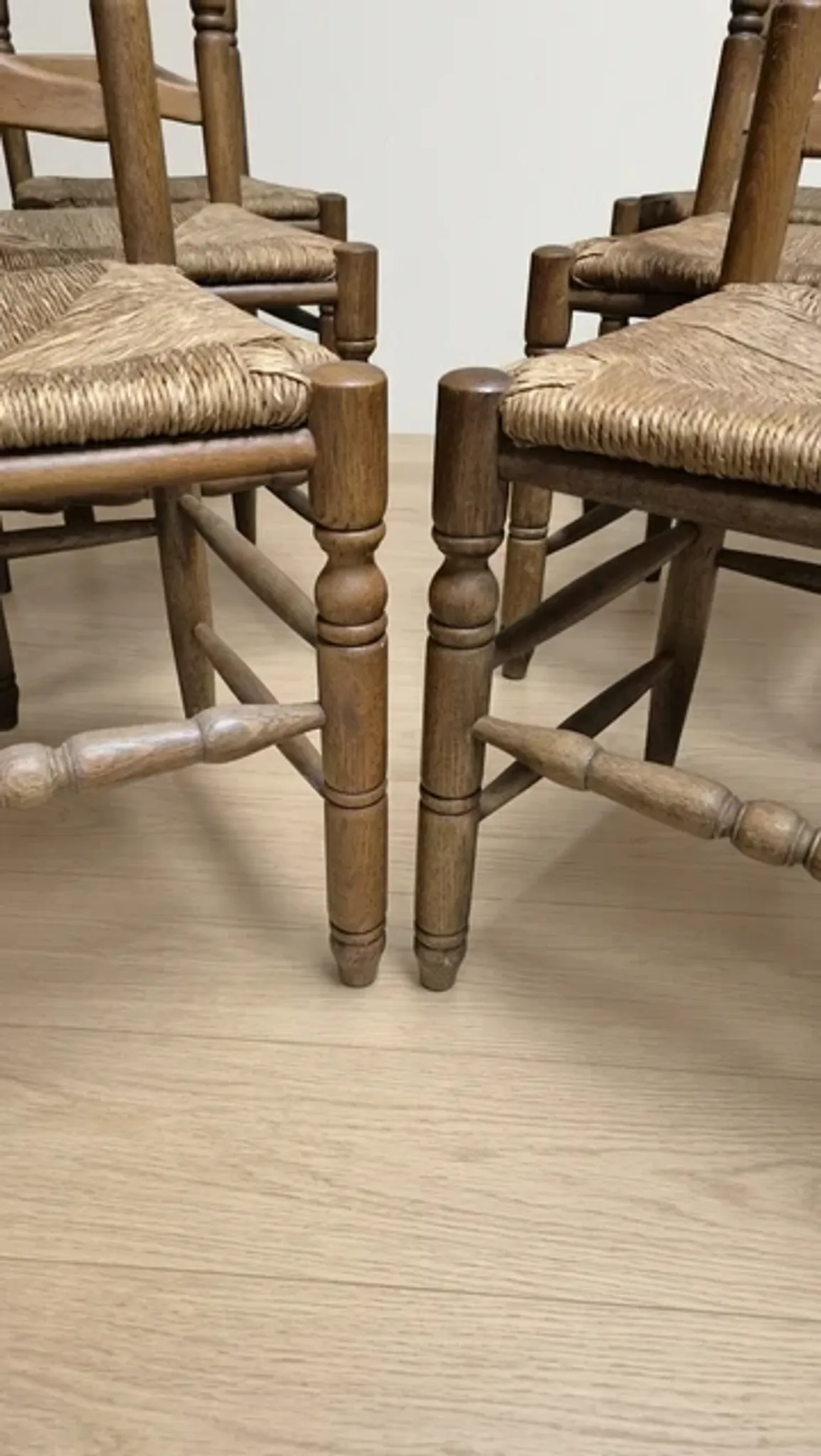 Set of 6 vintage wooden ladder-back dining chairs with woven seats, 20th century, 105 × 38 cm