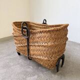 Magazine rack or log rack in straw with brutalist base from the 50s