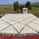 Very large vintage Beni Ouarain rug in cream wool with black diamonds, 426x344cm.