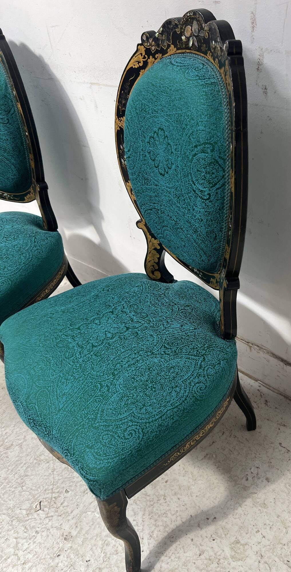 Pair of Napoleon III chairs in black lacquered wood, 19th century.