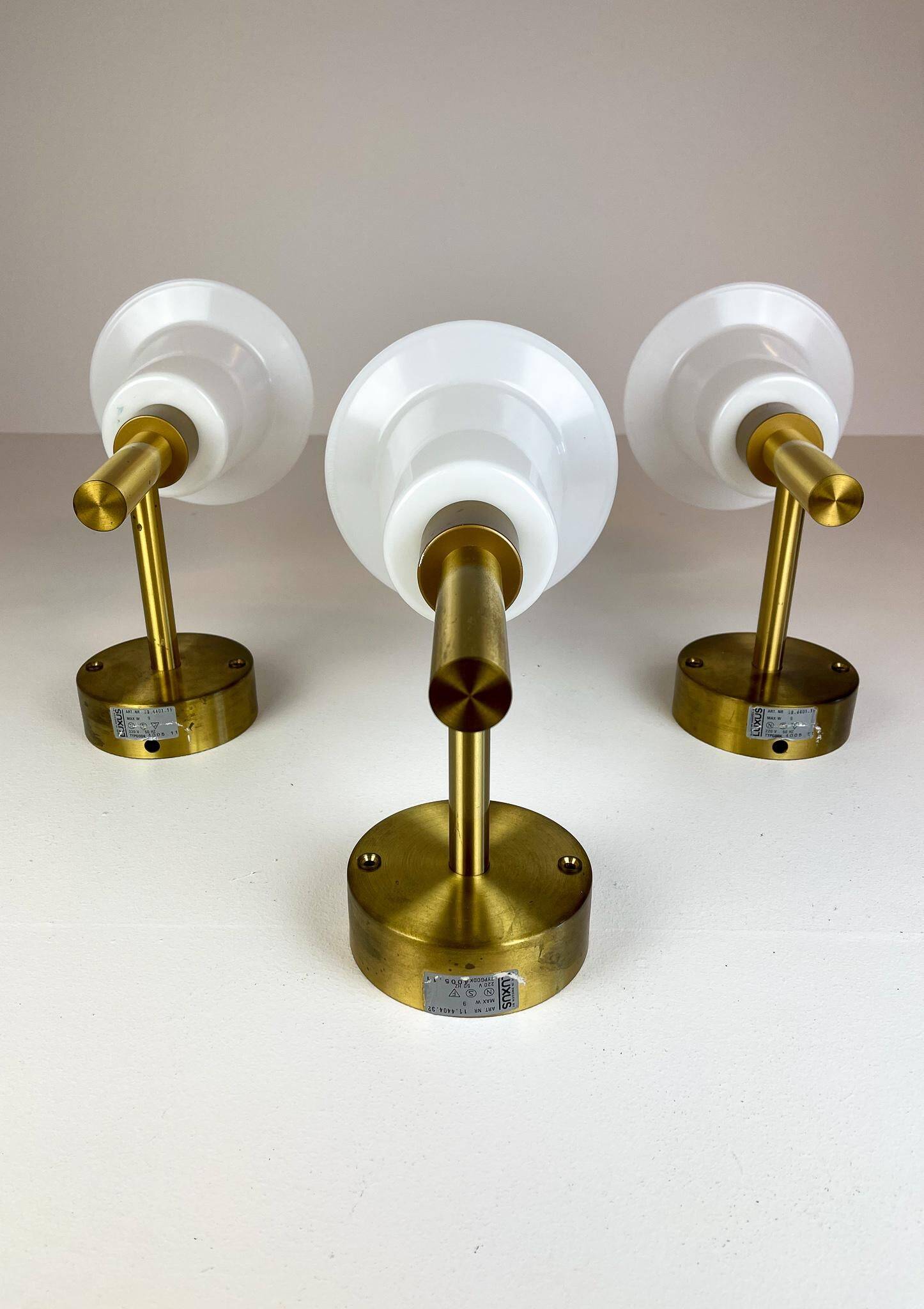 Mid-century brass and acrylic wall lamps Luxus, Sweden, 1960s