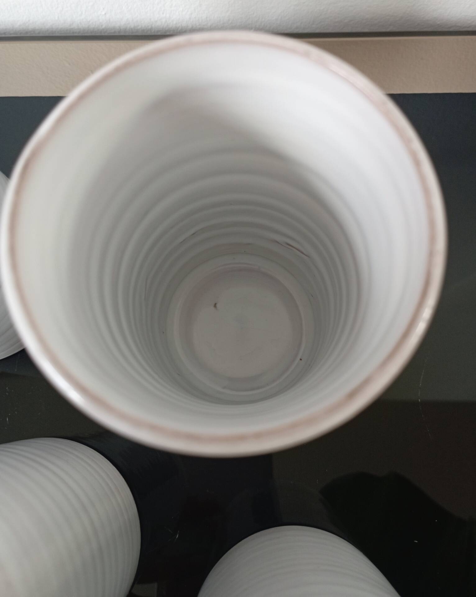 4 vintage stoneware cups in white