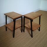 A pair of bedside tables