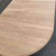 Table à manger ronde extensible décapée en merisier massif brut pied centra